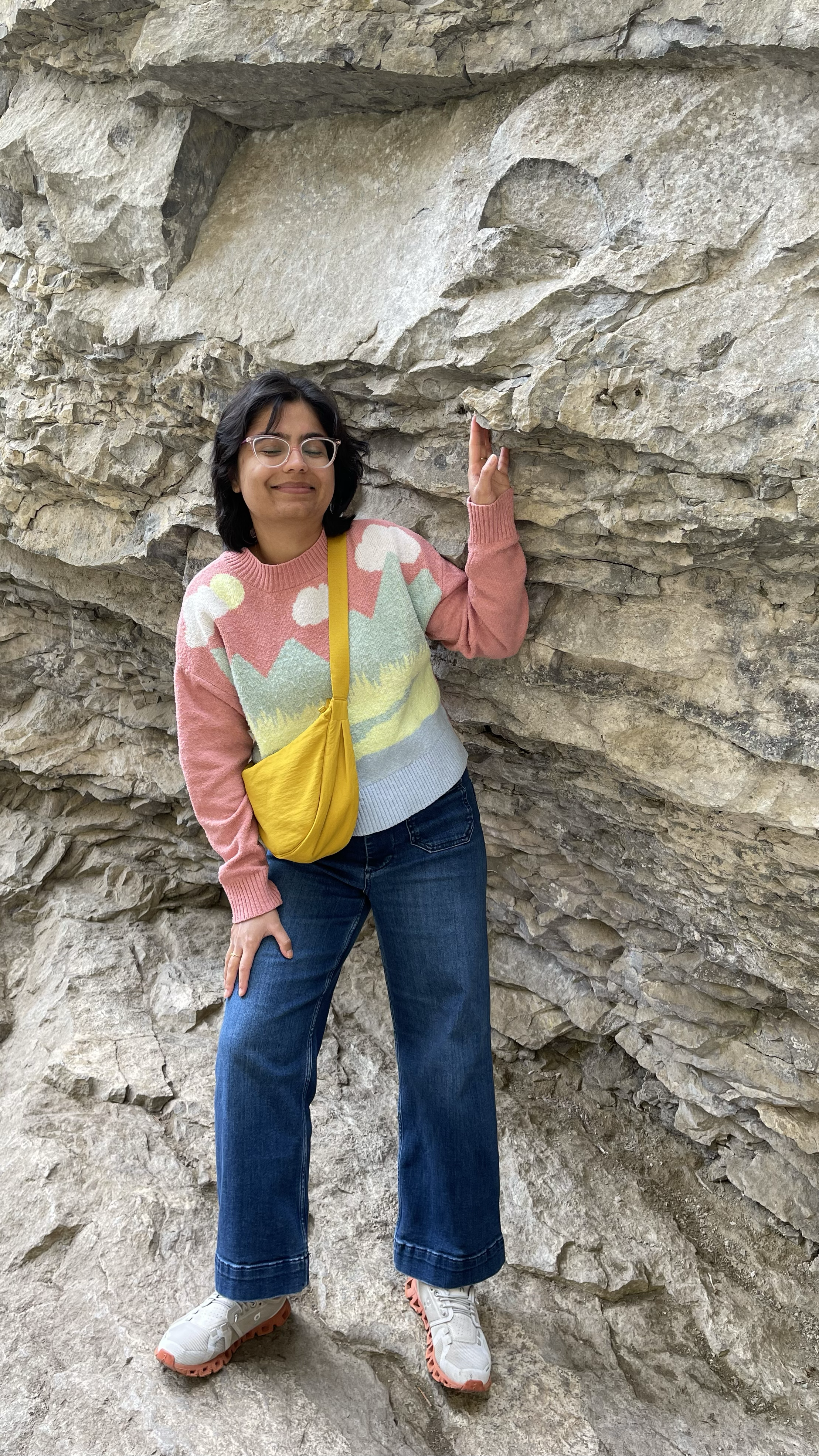 A picture of Aakanksha standing on a big rock